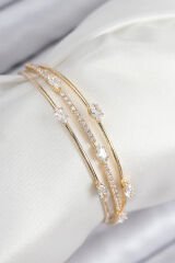 Pirinç Zirkon Taşlı Su Yolu Model Gold Renk Kadın Bileklik