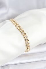 Pirinç Gold Renk VIP Seri Sarmal Damla Model Zirkon Taşlı Kadın Bileklik