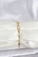 Pirinç Gold Renk VIP Seri Kemik Model Zirkon Taşlı Kadın Bileklik