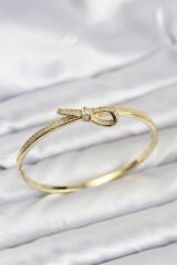 Pirinç Gold Renk Zirkon Taşlı Fiyonk Model Kadın Kelepçe Bileklik